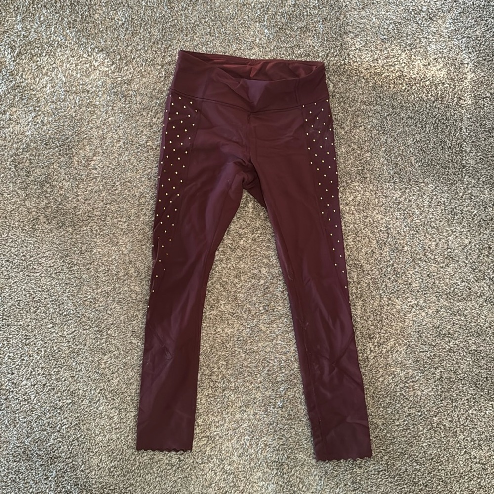 Maroon and gold Lululemon cropped leggings